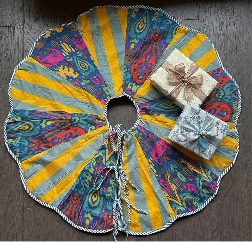 Colorful Christmas tree skirts displayed with decorated trees and presents.