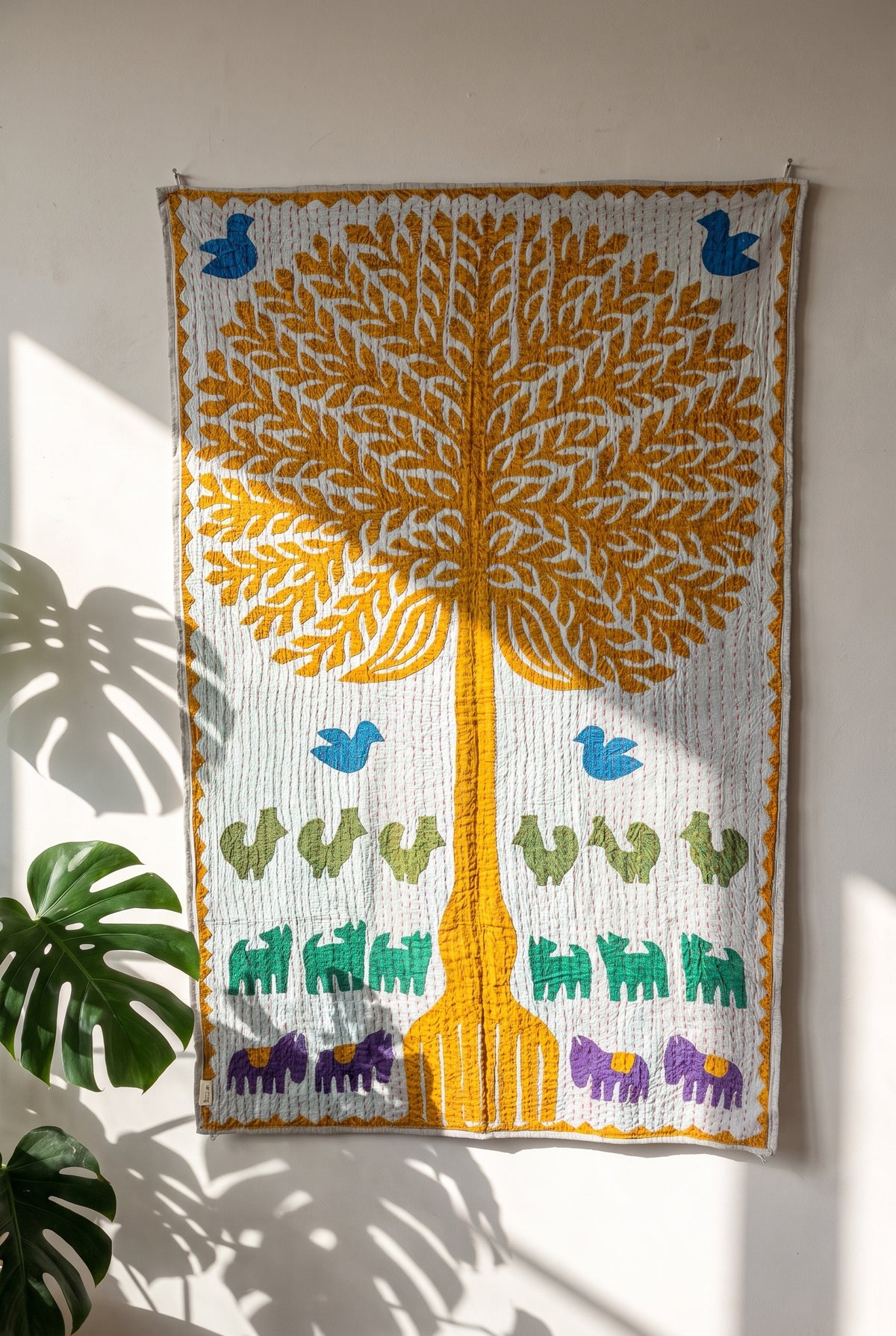 Serene Lotus Kantha Appliqué Pure Cotton Wall Hanging — textile display on wall