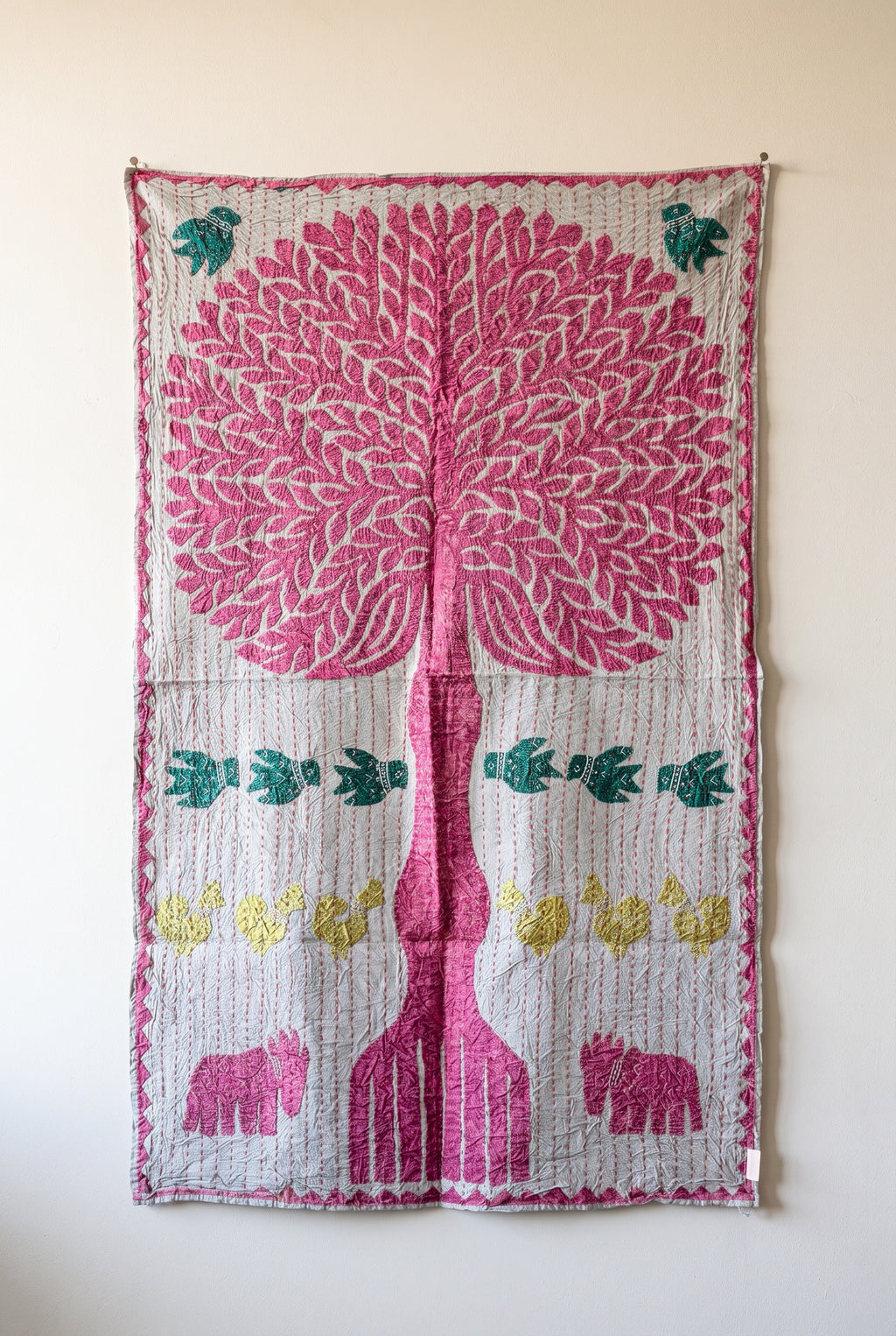 Hearth Terracotta Kantha Appliqué Pure Cotton Wall Hanging — full hanging in studio view