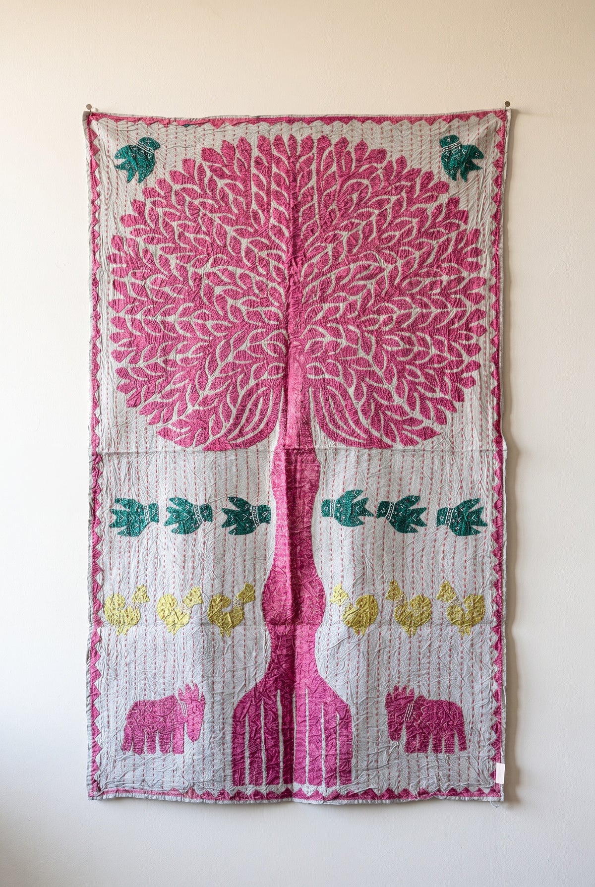 Hearth Terracotta Kantha Appliqué Pure Cotton Wall Hanging — full hanging in studio view