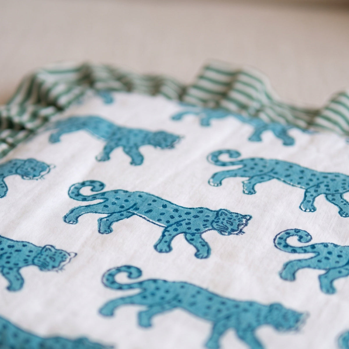 Elephant Meadow reversible cotton baby blanket, side one, macro