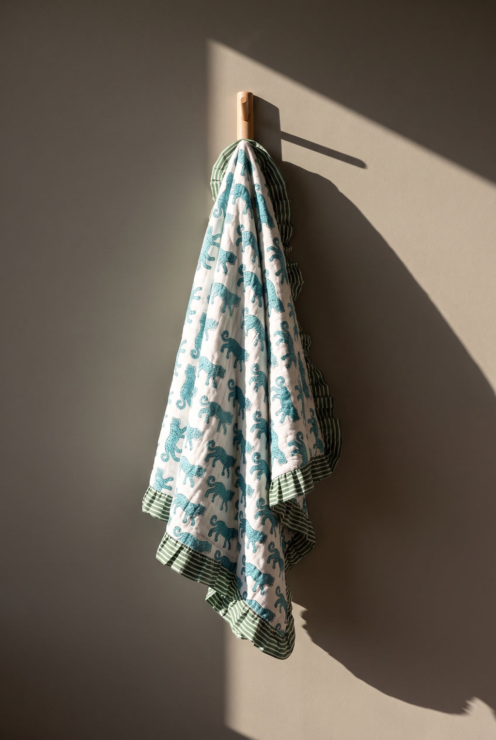 Elephant Meadow reversible cotton baby blanket, side one, peg