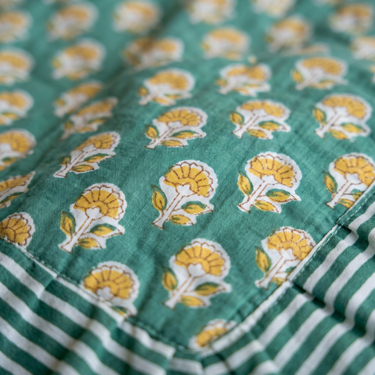 Elephant Meadow reversible cotton baby blanket, side two, macro