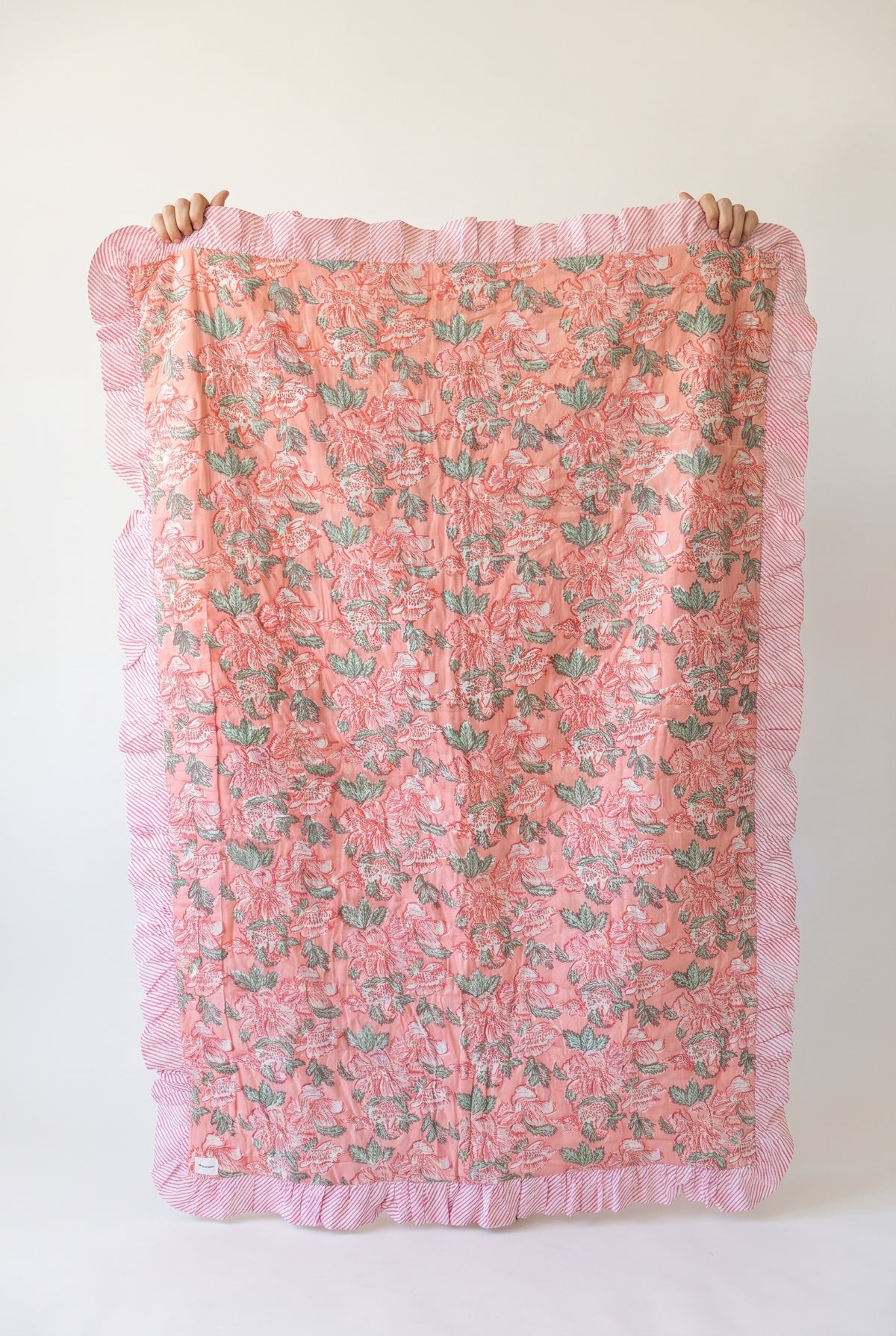 Petal Play reversible cotton baby blanket, side one, catalog hold