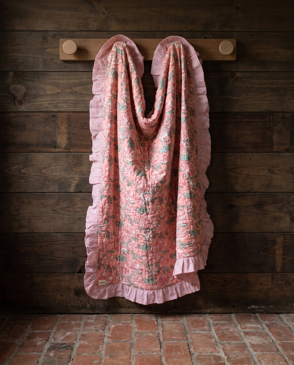 Petal Play reversible cotton baby blanket, side one, rustic pegs