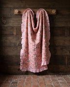 Petal Play reversible cotton baby blanket, side one, rustic pegs