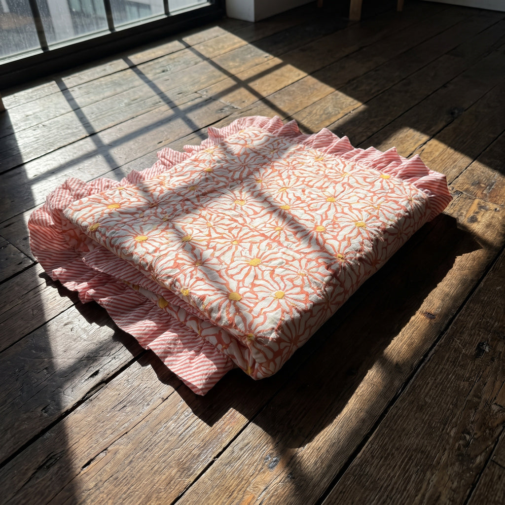 Petal Play reversible cotton baby blanket, side two, floor