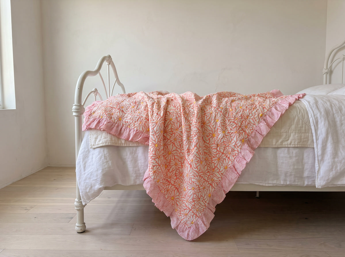 Petal Play reversible cotton baby blanket, side two, iron bed