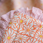 Petal Play reversible cotton baby blanket, side two, macro