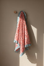 Garden Stories reversible cotton baby blanket, side one, peg
