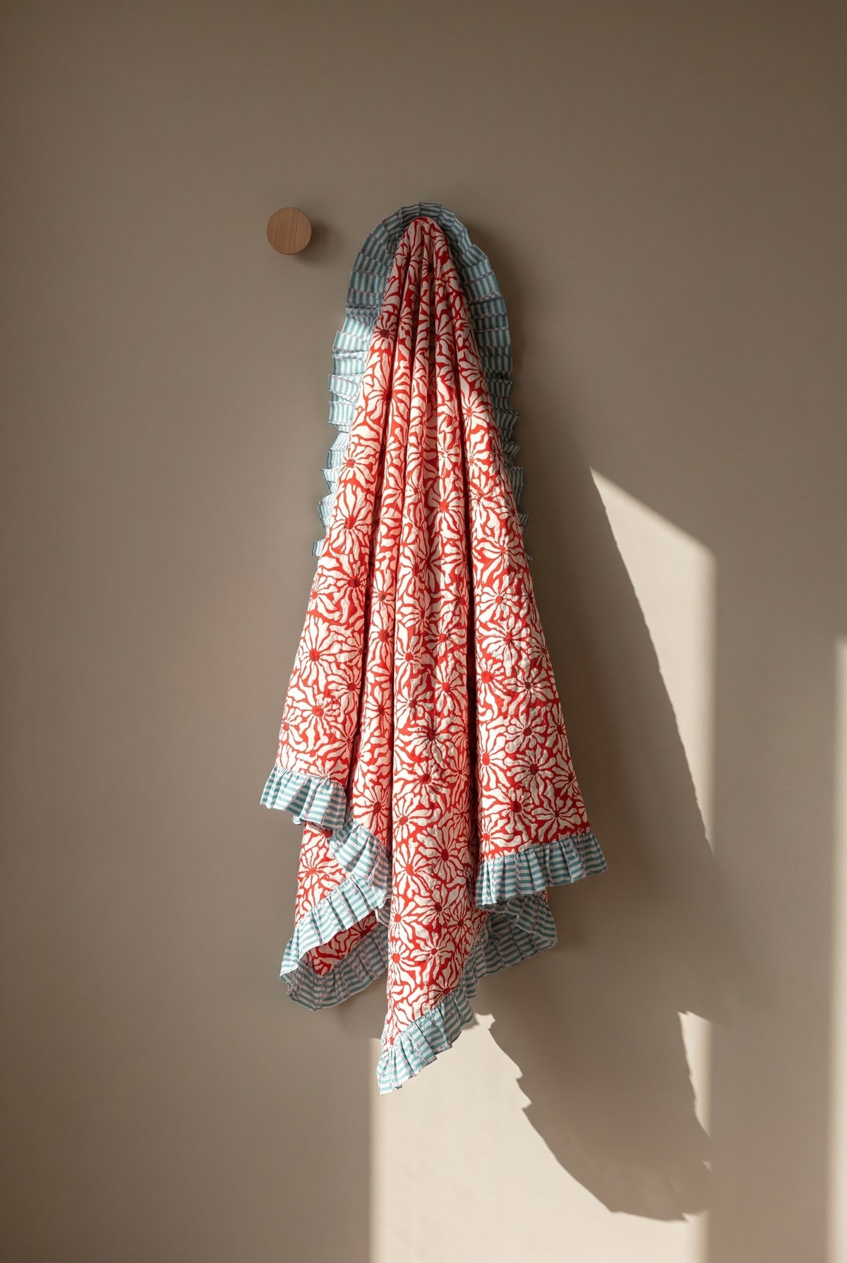 Garden Stories reversible cotton baby blanket, side one, peg