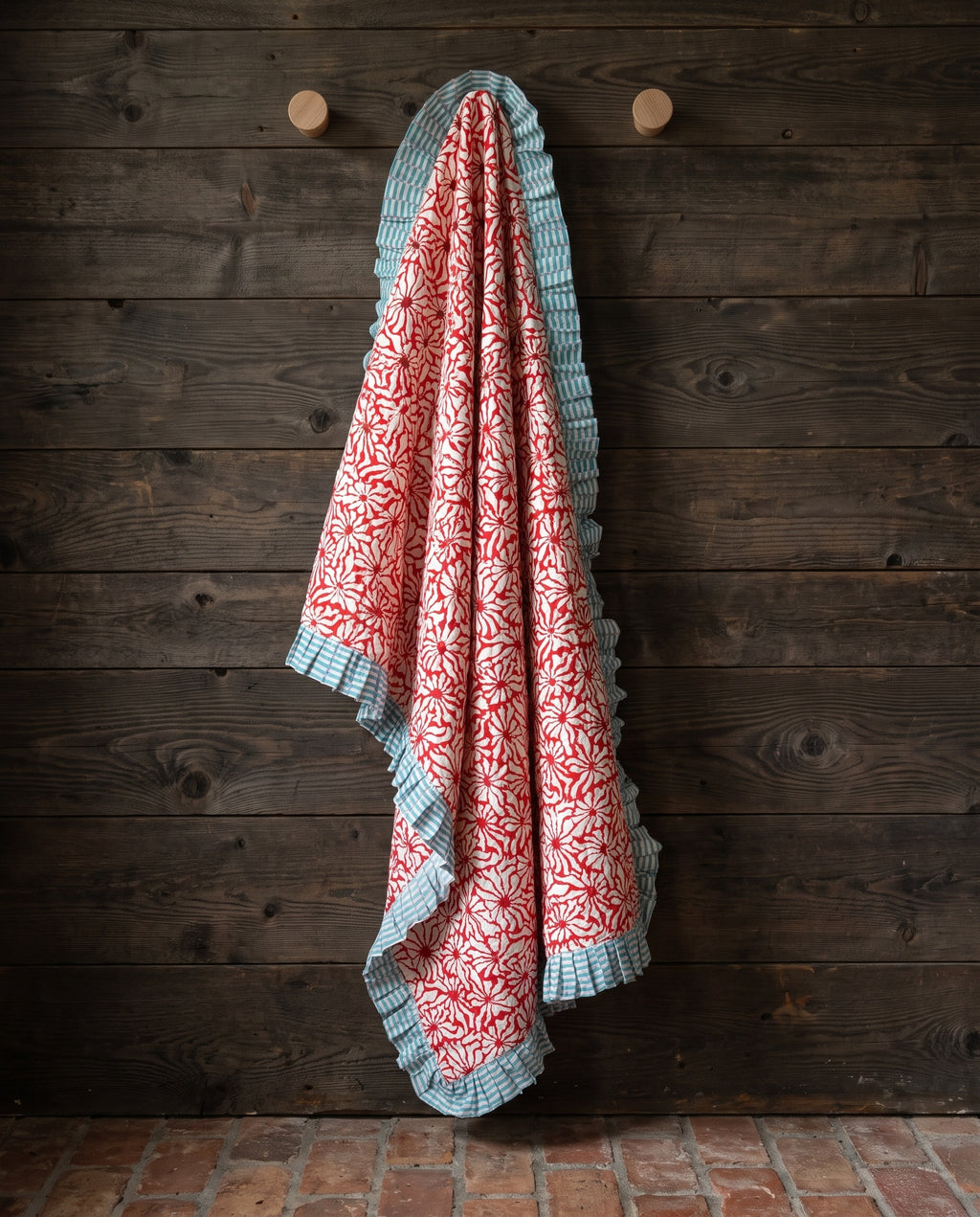 Garden Stories reversible cotton baby blanket, side one, rustic pegs