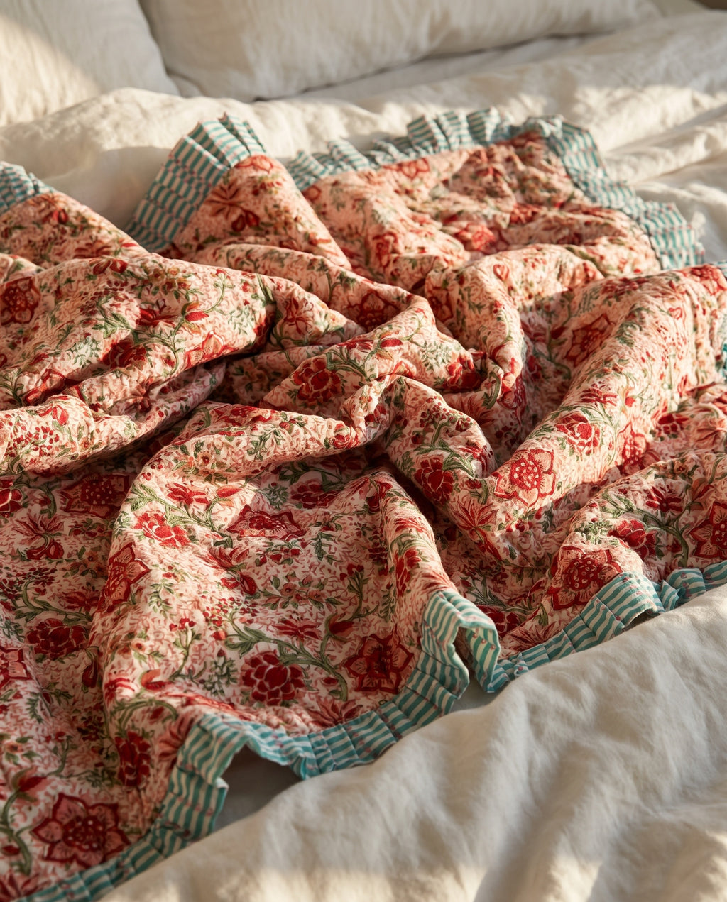 Garden Stories reversible cotton baby blanket, side two, bed editorial