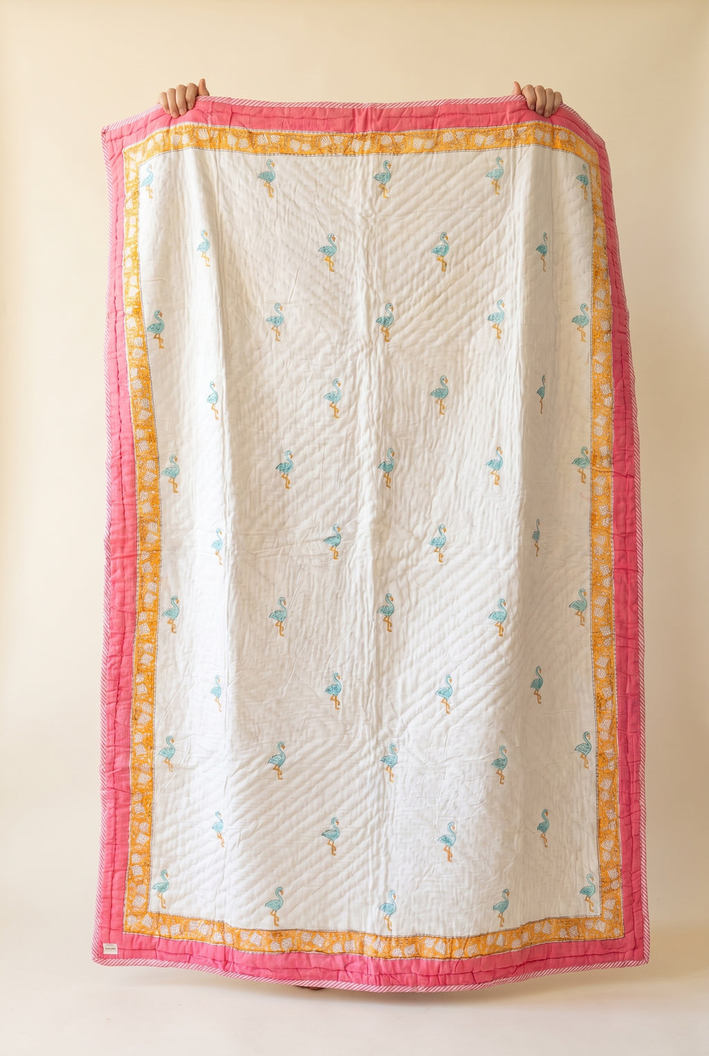 Flamingo Daydreams reversible cotton baby blanket, side one, catalog hold