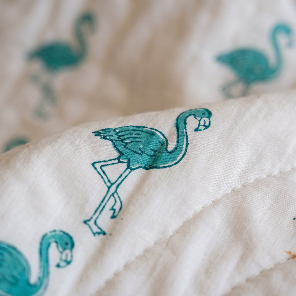 Flamingo Daydreams reversible cotton baby blanket, side one, macro