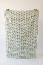 Puppy Promenade reversible cotton baby blanket, side two, catalog hold