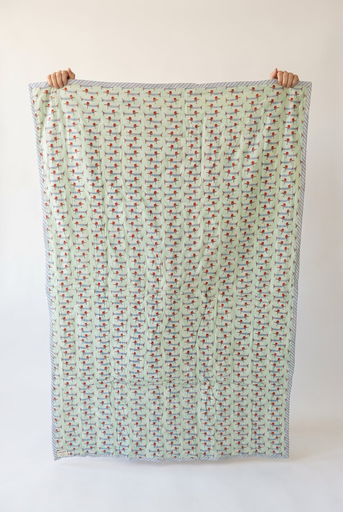 Puppy Promenade reversible cotton baby blanket, side two, catalog hold