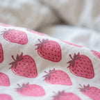 Berry Picnic reversible cotton baby blanket, side one, macro