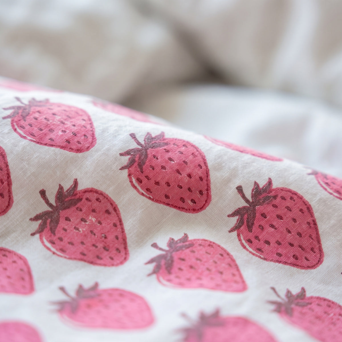 Berry Picnic reversible cotton baby blanket, side one, macro