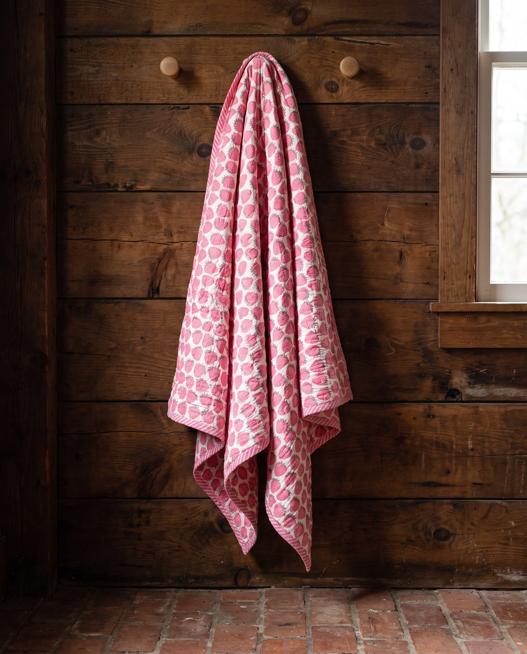 Berry Picnic reversible cotton baby blanket, side one, rustic pegs