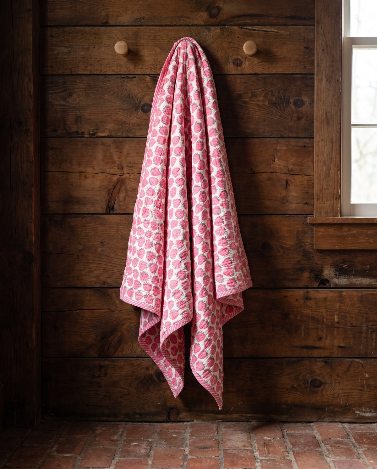 Berry Picnic reversible cotton baby blanket, side one, rustic pegs