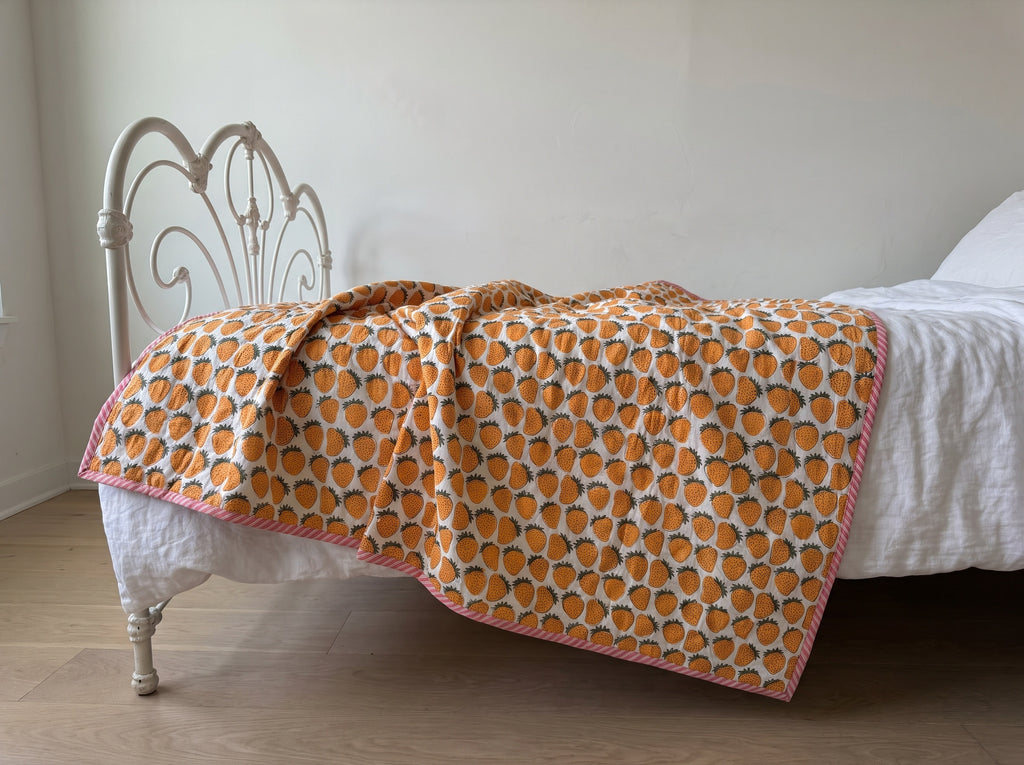 Berry Picnic reversible cotton baby blanket, side two, iron bed