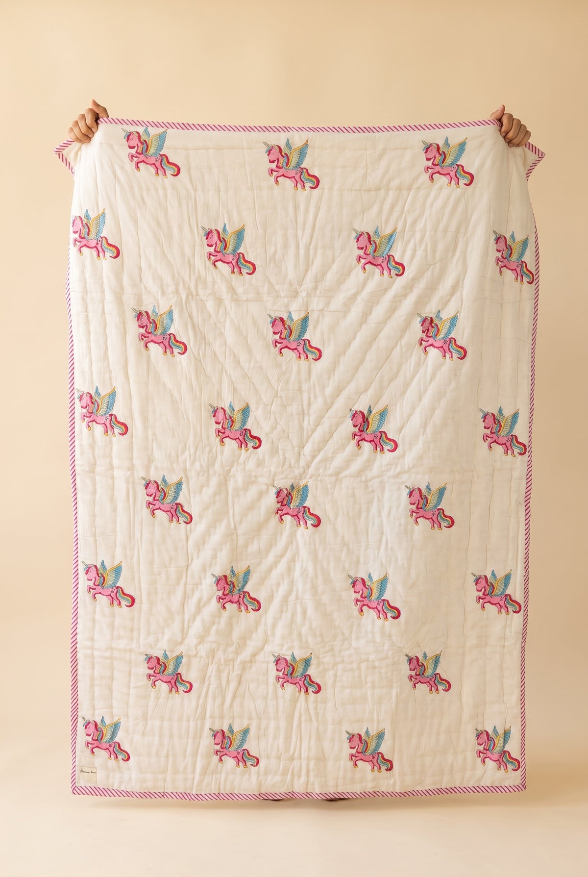 Unicorn Wishes reversible cotton baby blanket, side one, catalog hold