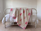 Unicorn Wishes reversible cotton baby blanket, side two, iron bed