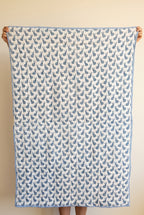 Bunny Trails reversible cotton baby blanket, side one, catalog hold