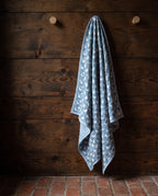 Bunny Trails reversible cotton baby blanket, side two, rustic pegs