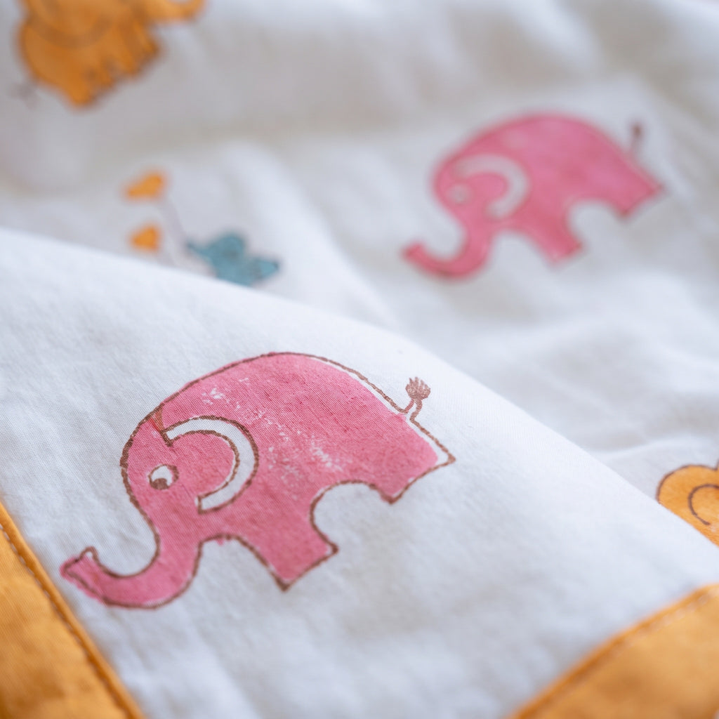 Elephant Wishes reversible cotton baby blanket, side one, macro