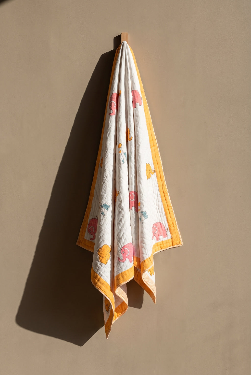 Elephant Wishes reversible cotton baby blanket, side one, peg