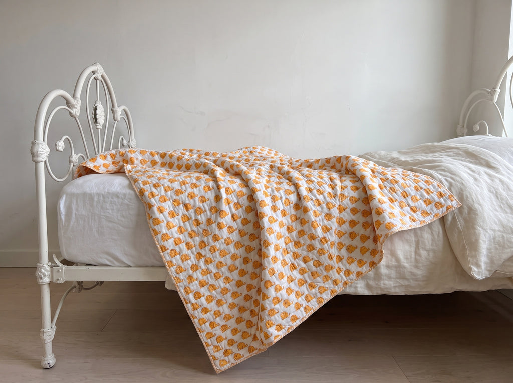 Elephant Wishes reversible cotton baby blanket, side two, iron bed