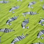 Zebra Wanderings reversible cotton baby blanket, side one, macro