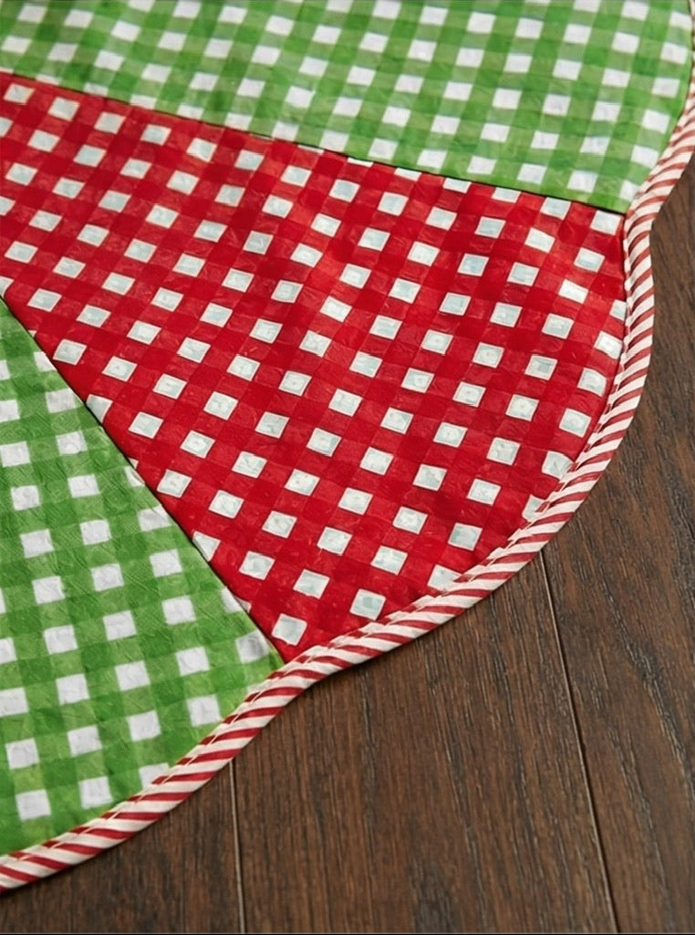 Four different Christmas tree skirts on various surfaces with a cityscape background.