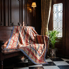 Trillium Bagru Block Print Kantha Throw — front side styled in a home entryway