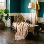Fireweed Vintage Bagru Kantha Throw — reverse side styled in a jewel-toned living room
