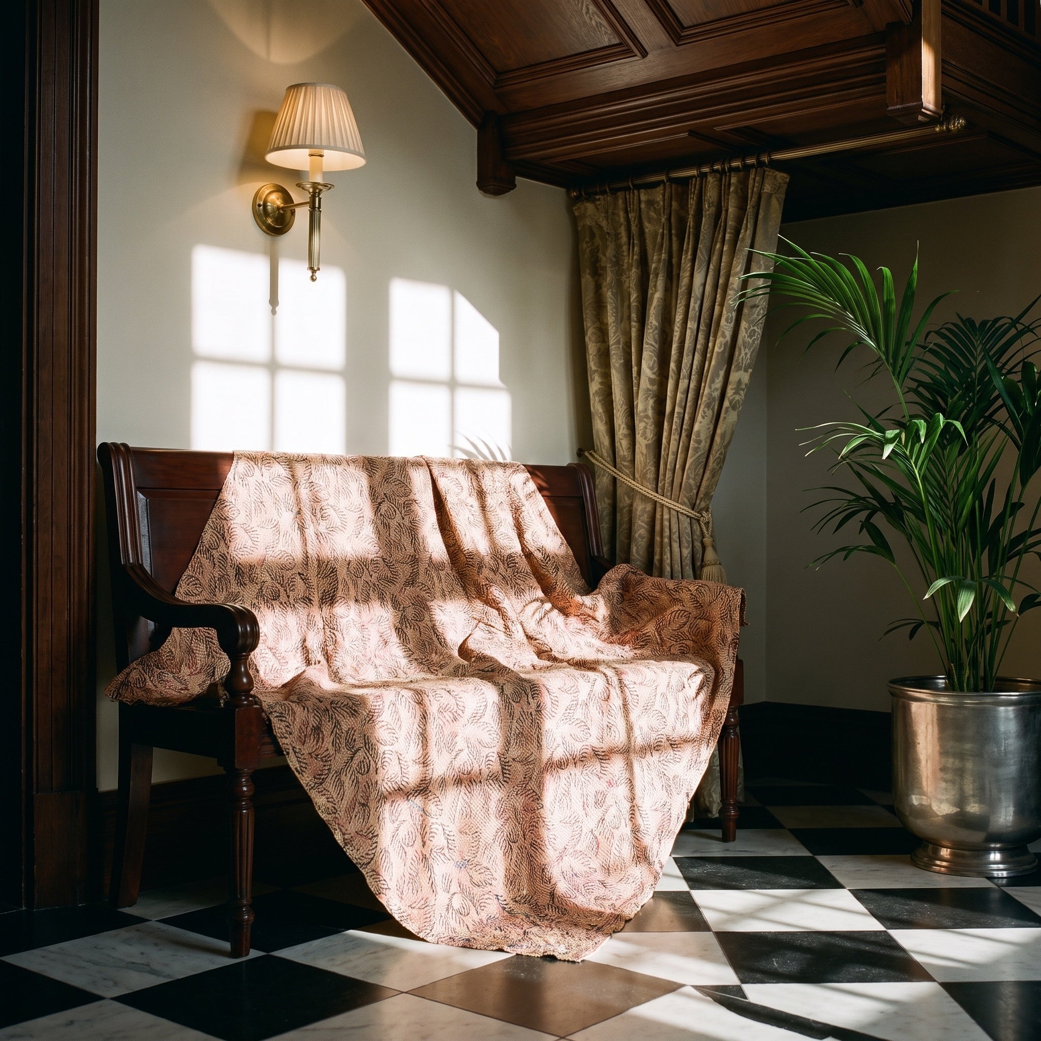 Goldenrod Bagru Block Print Kantha Throw — reverse side styled in a home entryway