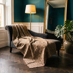 Sweetgrass Vintage Bagru Kantha Throw — reverse side styled in a jewel-toned living room
