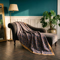 Prairie Crocus Vintage Bagru Block Print Kantha Throw — front side styled in a jewel-toned living room