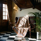 Bearberry Bagru Block Print Kantha Throw — front side styled in a home entryway
