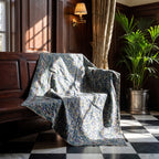 Cattail Bagru Block Print Kantha Throw — front side styled in a home entryway