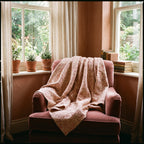 Saskatoon Bagru Kantha Throw — reverse side draped over a chair in a reading nook