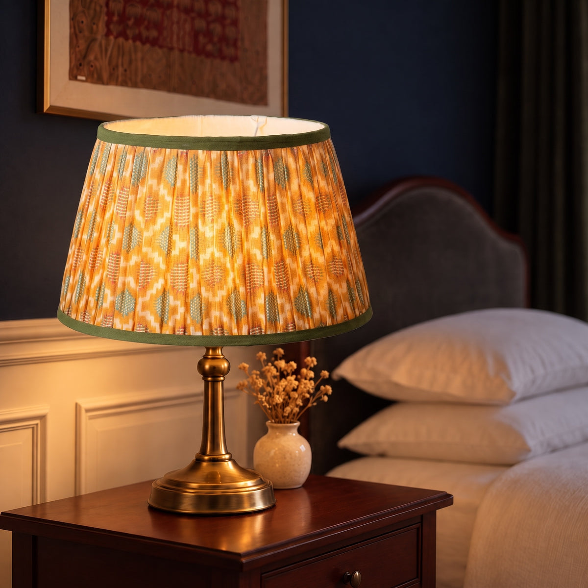 Handmade pleated cotton lampshade glowing in an elevated interior