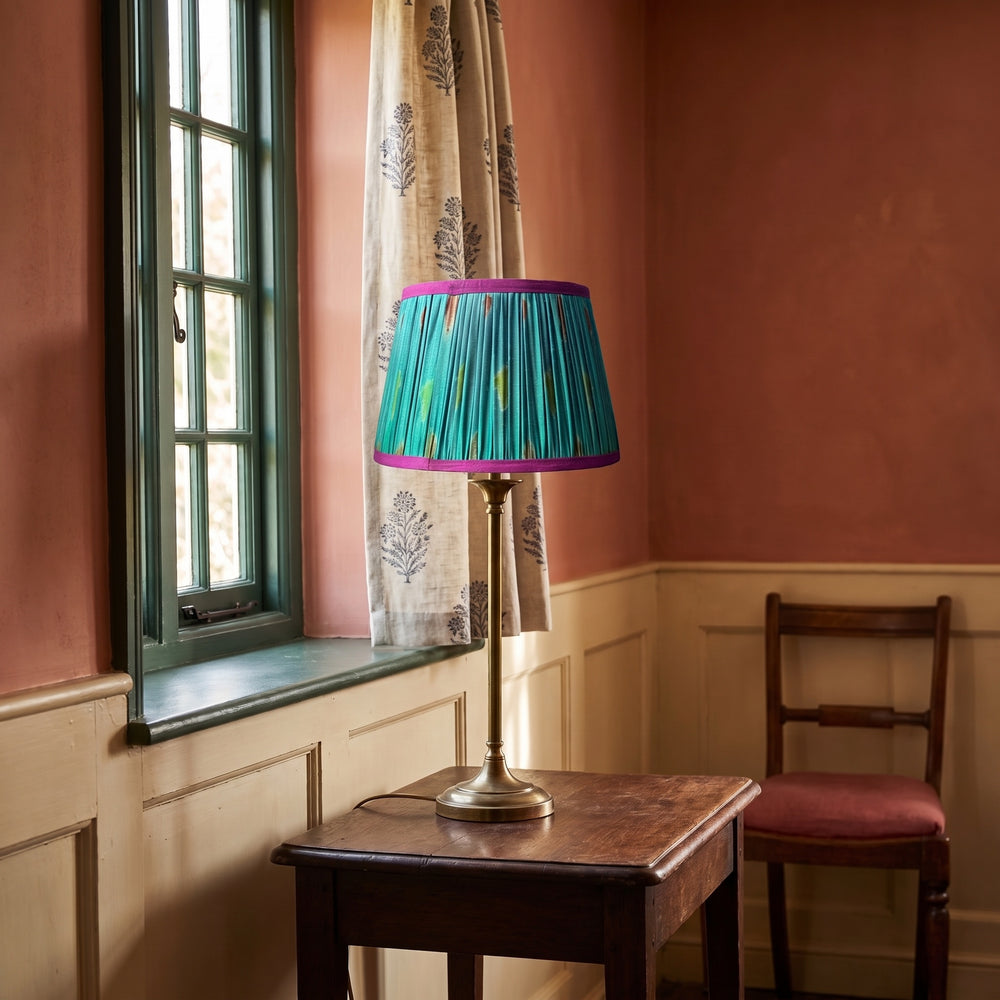 Close detail of pleated cotton lampshade fabric