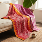 BACKSIDE — reverse side of Heirloom Passage Vintage Cotton Kantha Throw on a sofa