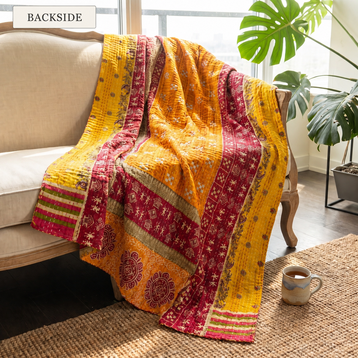 BACKSIDE — reverse side of Heritage Journey Vintage Cotton Kantha Throw on a sofa