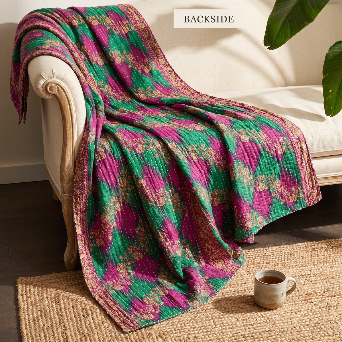 BACKSIDE — reverse side of Meadow Journey Vintage Cotton Kantha Throw on a sofa