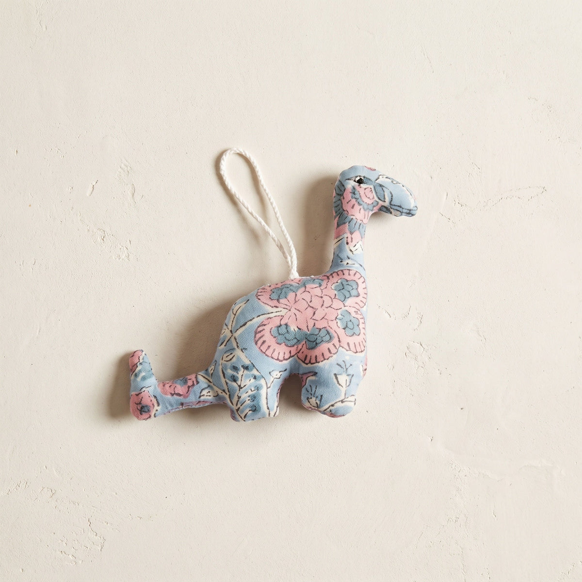 Handcrafted cotton elephant or dinosaur Christmas ornament – Whisper Mist design, studio hero. Example from random pack of six.