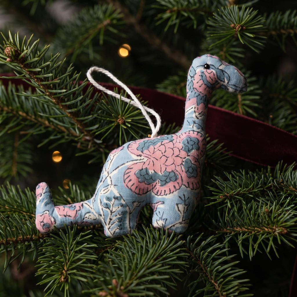 Handcrafted cotton elephant or dinosaur Christmas ornament – Whisper Mist design, hanging on a Christmas tree. Example from random pack of six.